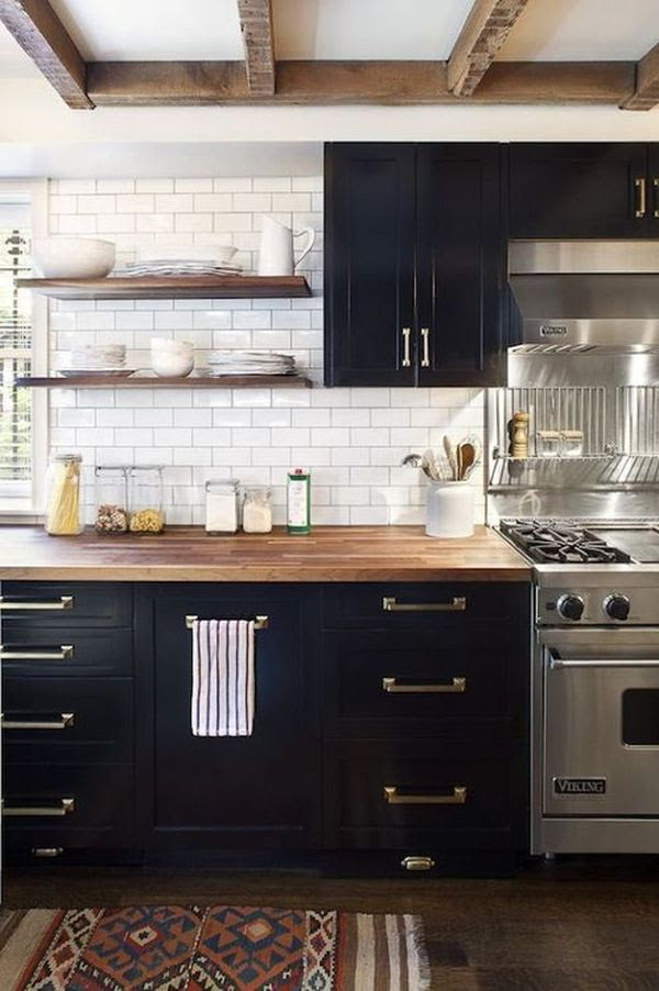 Balance out the black and white with wooden shelves and countertops