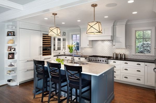 The kitchen island introduces a welcomed touch of color