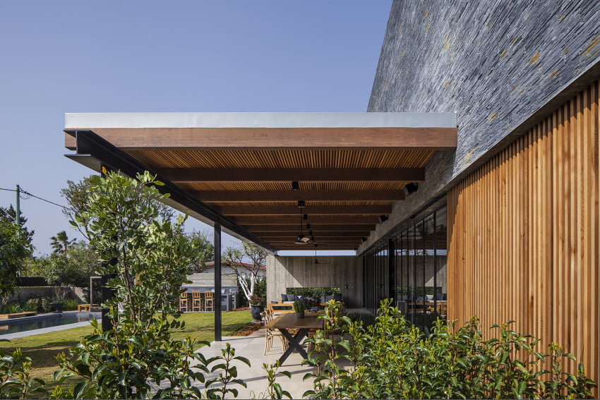 front porch with outdoor seating and eating area