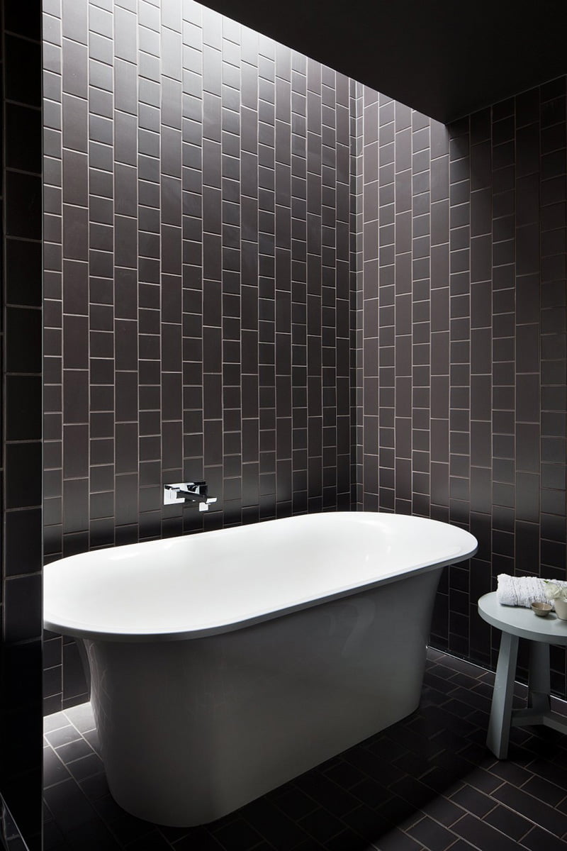black and white bathroom is in a home in Melbourne, Australia, designed by Bower Architecture