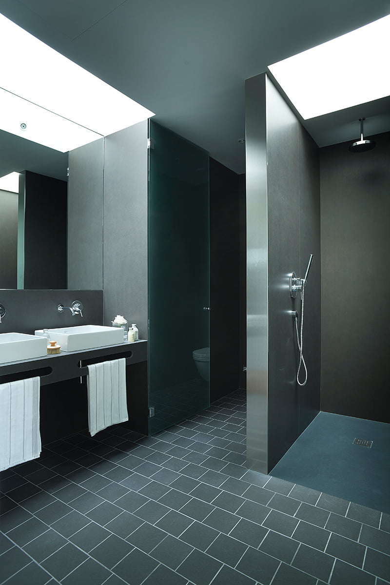 black and white bathroom is in a villa in Girona, Spain designed by Lagula Arquitectes