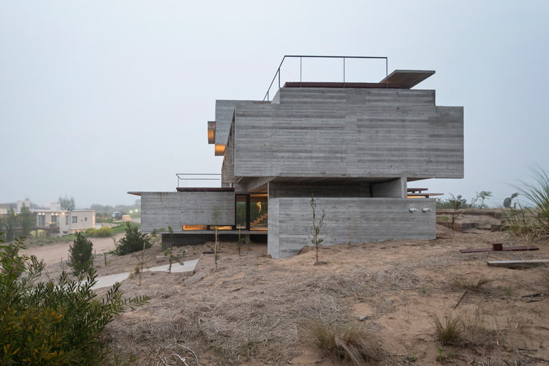 exposed concrete modern house side view