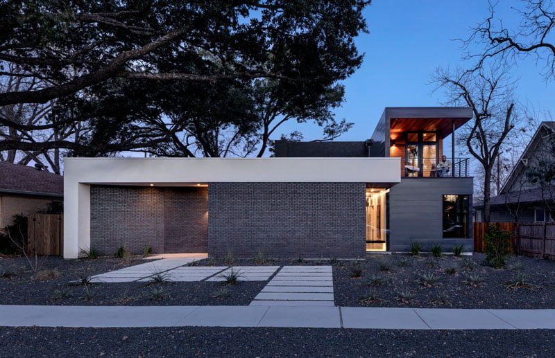 first floor balcony over looking front yard of modern house