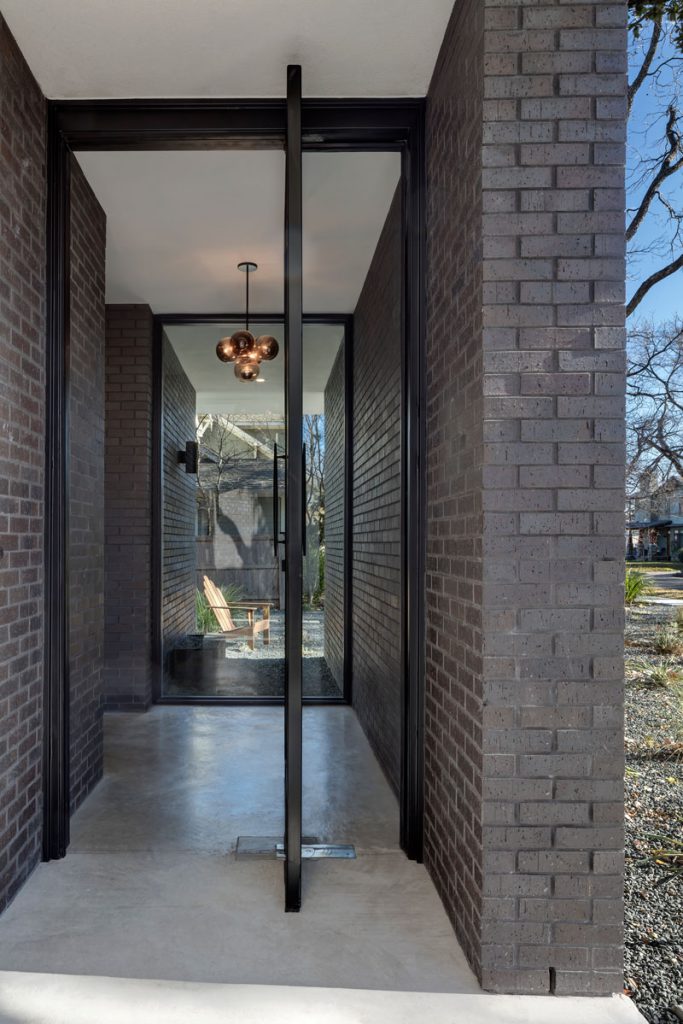 indirect entrance area with rivolving glass door