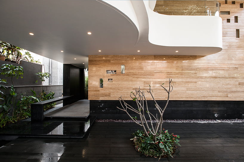 Entrance Canopy with integrated facade of modern indian house