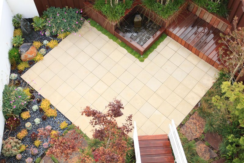 angular floor tiles in backyard patio