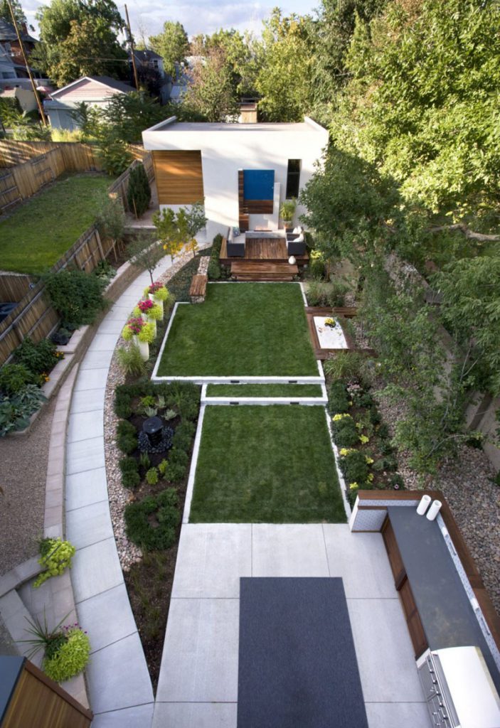 seating area, sandbox, outdoor kitchen in backyard landscaping ideas