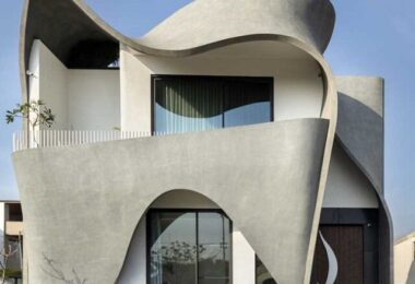 cropped-modern-Villa-house-ribbon-facade.jpg